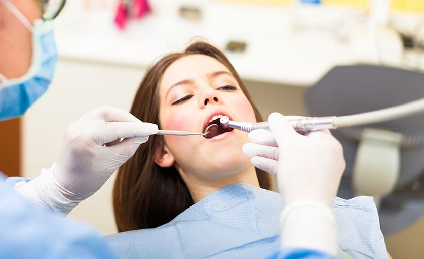 Woman getting a root canal