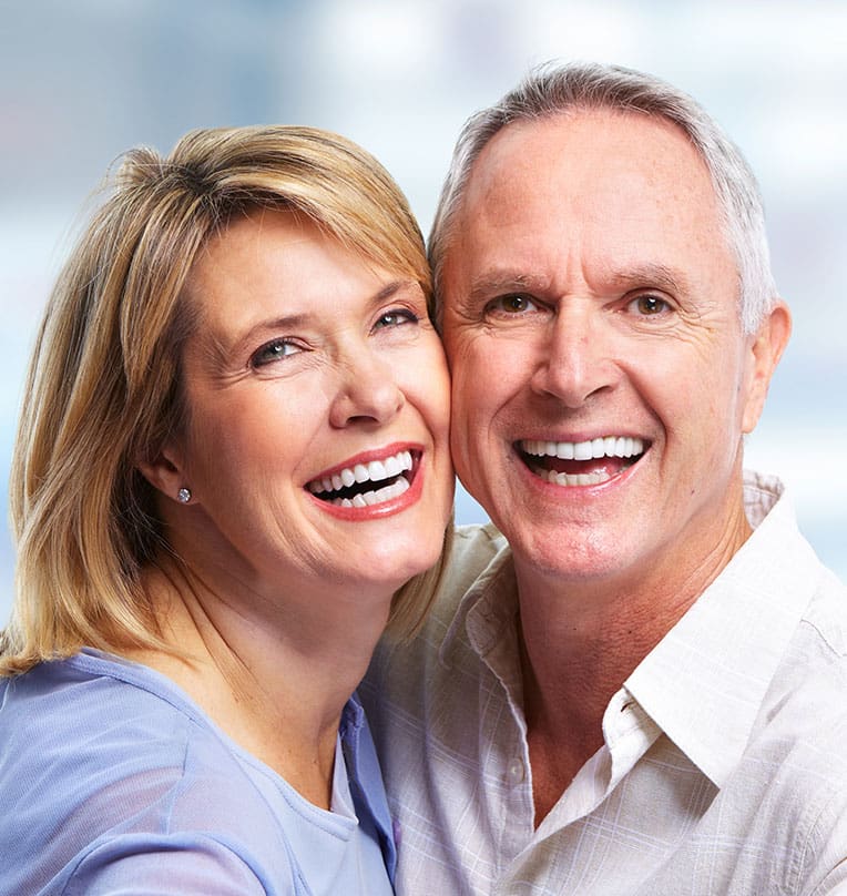 Older couple with healthy teeth